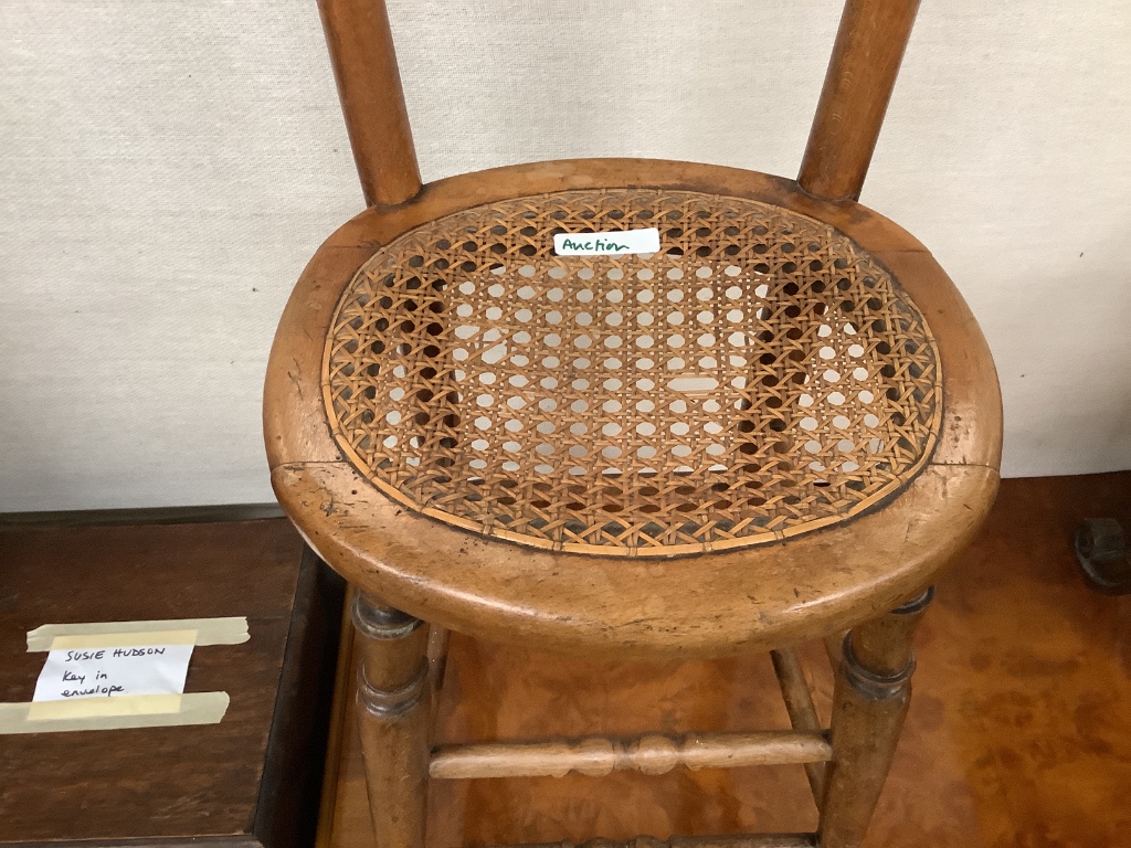 A Victorian beech caned seated correction chair, height 96cm
